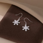 SLUYNZ 925 Sterling Silver Sparkling CZ Snowflake Earrings Drop for Women Snowflake Dangle Earrings Christmas Gifts