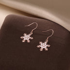 SLUYNZ 925 Sterling Silver Sparkling CZ Snowflake Earrings Drop for Women Snowflake Dangle Earrings Christmas Gifts