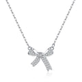 SLUYNZ 925 Sterling Silver Small Bow Pendant Necklace for Women Teens CZ Bow Necklace Chain Ribbon Necklace Choker