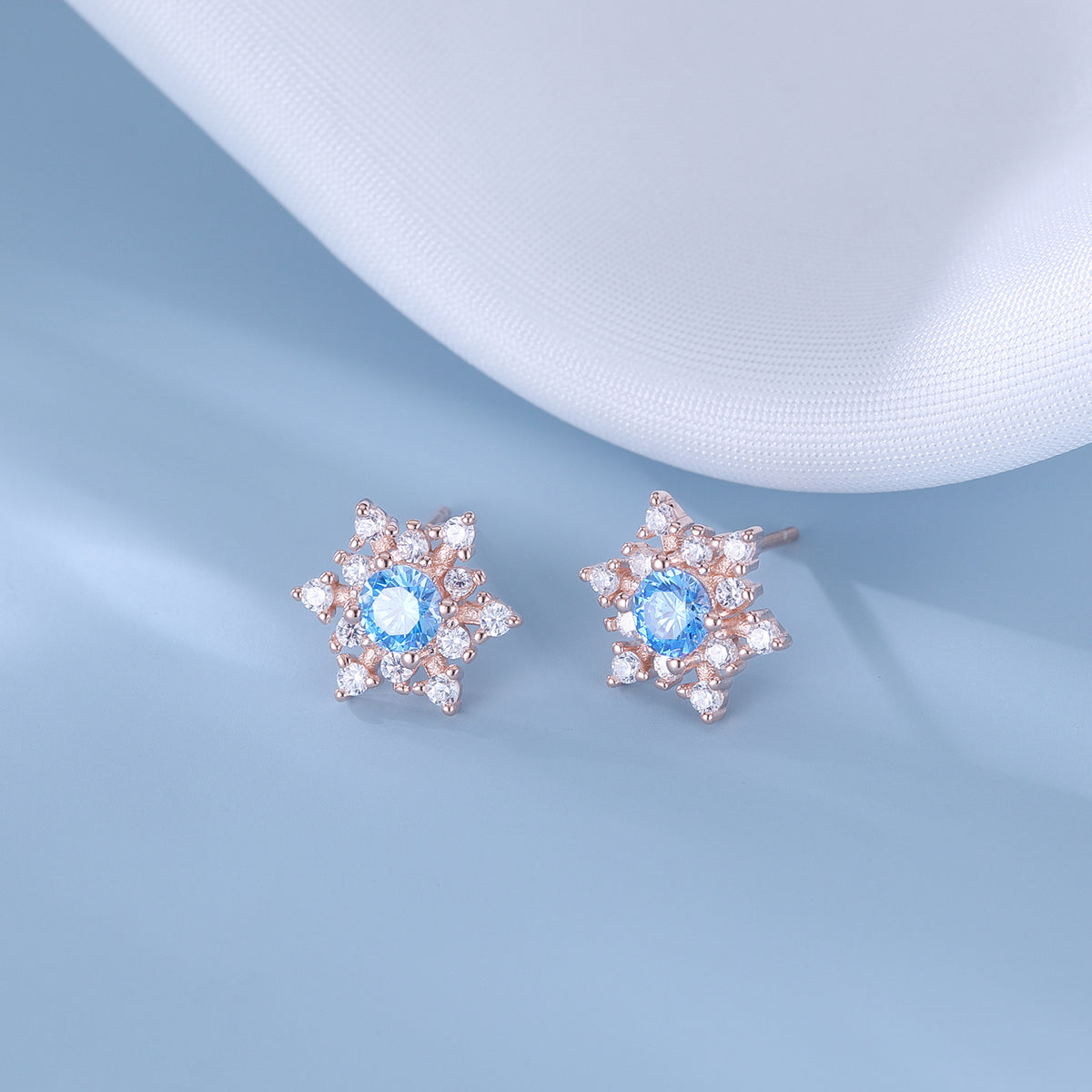 SLUYNZ Solid 925 Sterling Silver Sparkling Blue Crystal Snowflake Earrings Stud for Women Teens Pretty Snowflake Stud Earrings