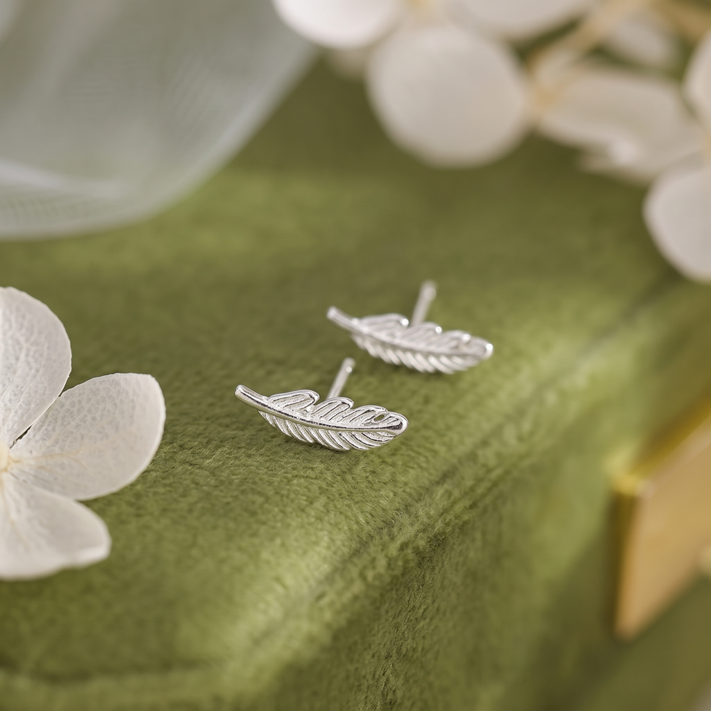 SLUYNZ 925 Sterling Silver Feather Studs Earrings for Women Girls Leaf Studs Earrings Small Earrings Tiny Studs